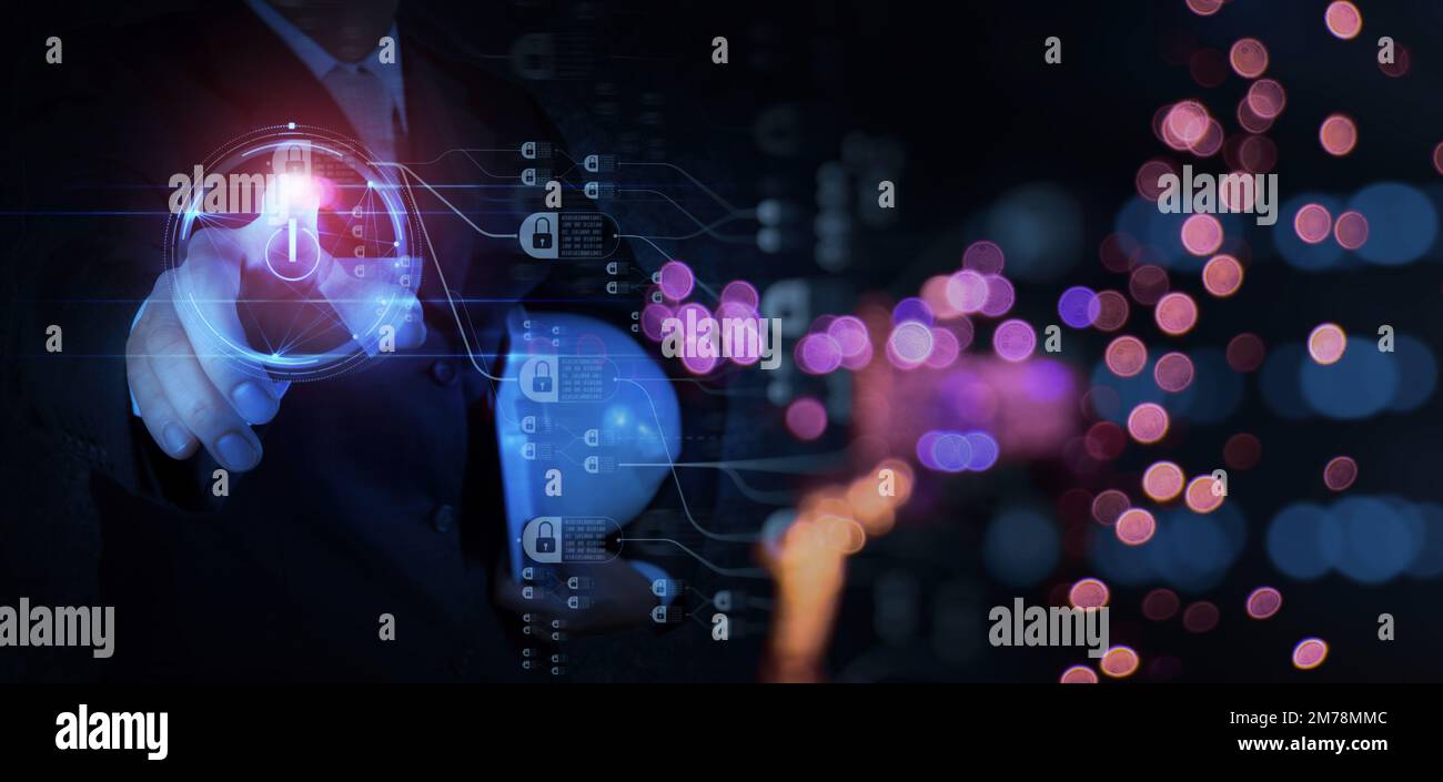 Engineer businessman hand pushing start icon on modern computerfor programming about cyber security,advance virtual network future technology blockcha Stock Photo