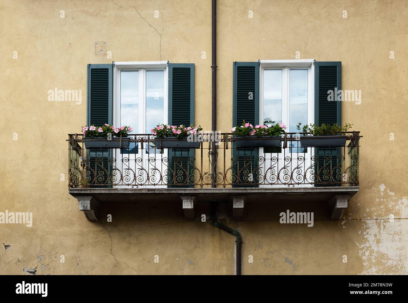 Italian home style balcony of old building. Stock Photo
