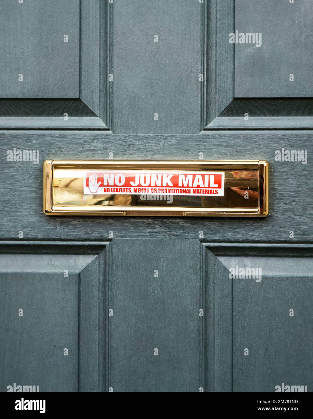 No junk mail sticker on polished brass letter box Stock Photo - Alamy