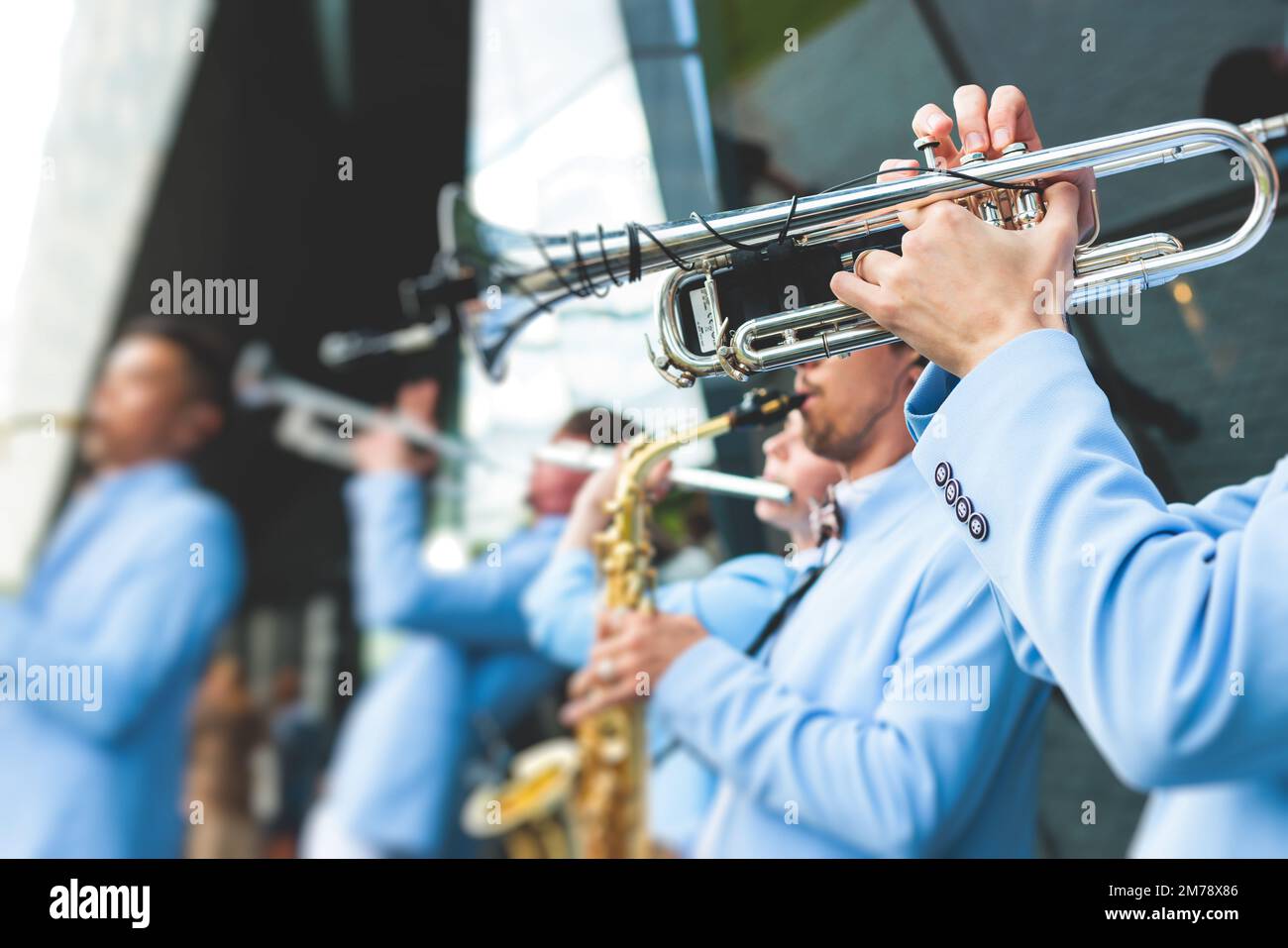 Concert view of a male trumpeter, professional trumpet player with
