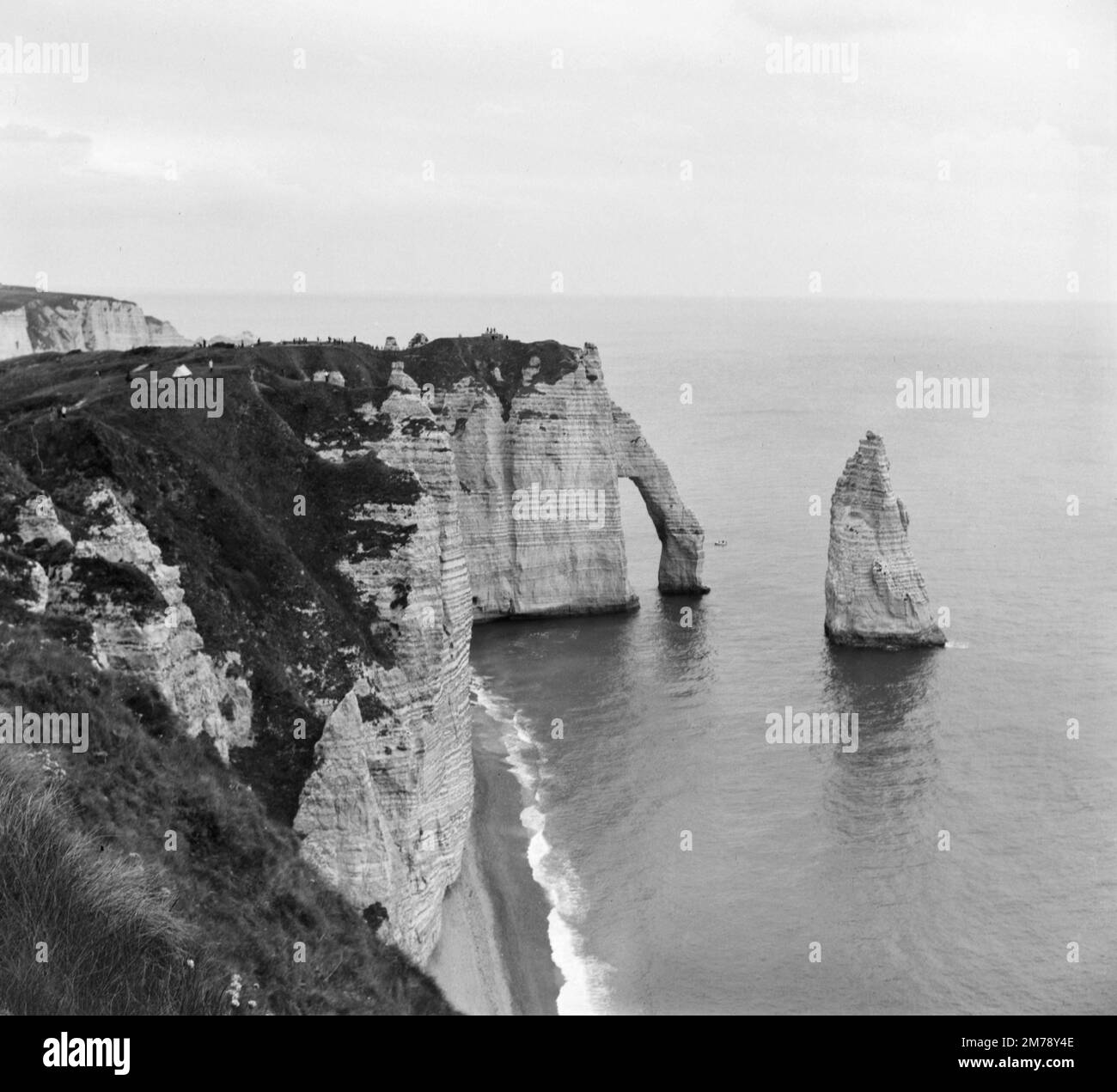 Chalk Cliffs, Natural Arch and the Needle or L'Aiguille on the coast at Etretat Normandy France