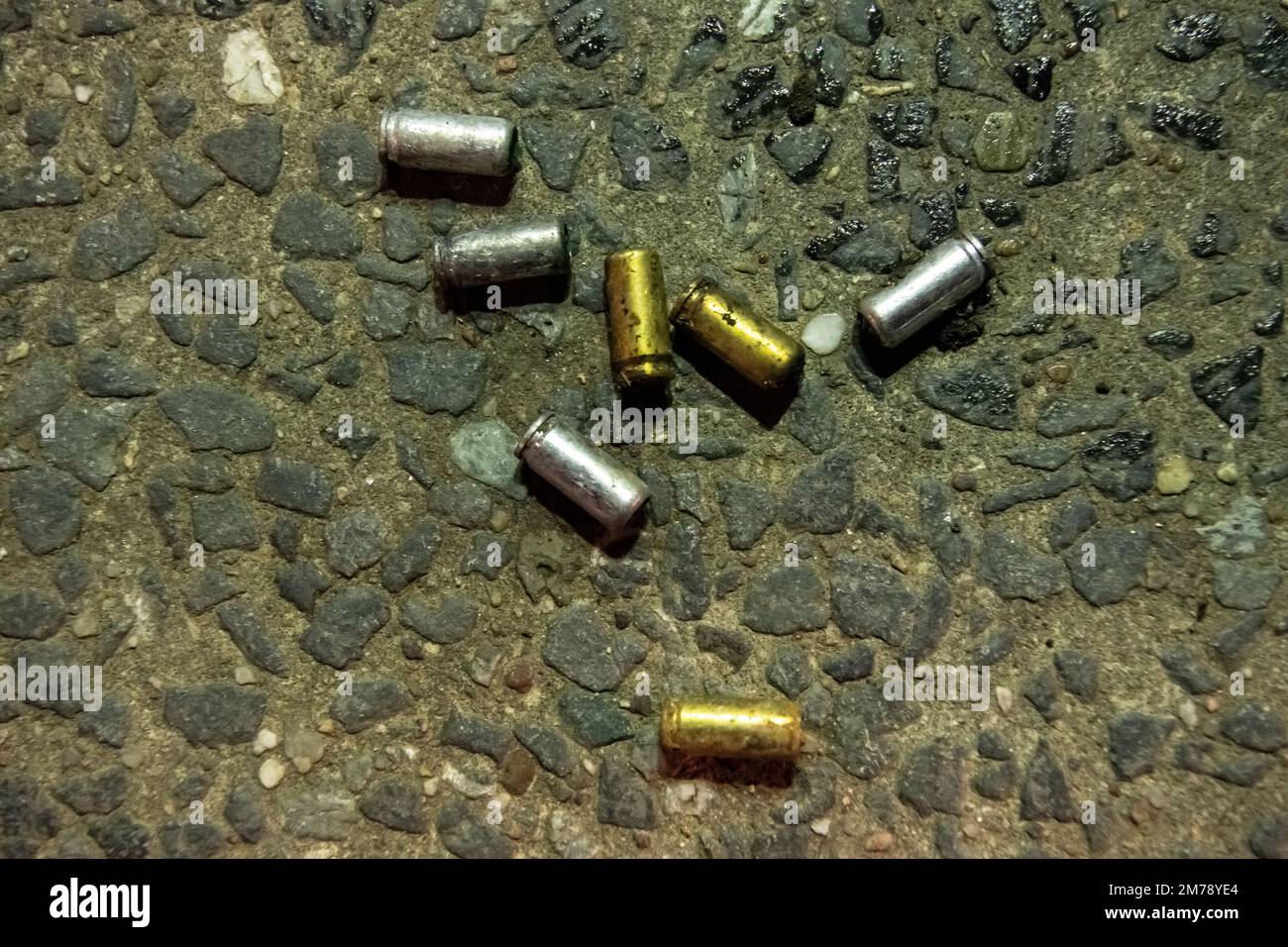 Berlin, Germany. 07th Jan, 2023. Shell casings lie on a sidewalk in the ...