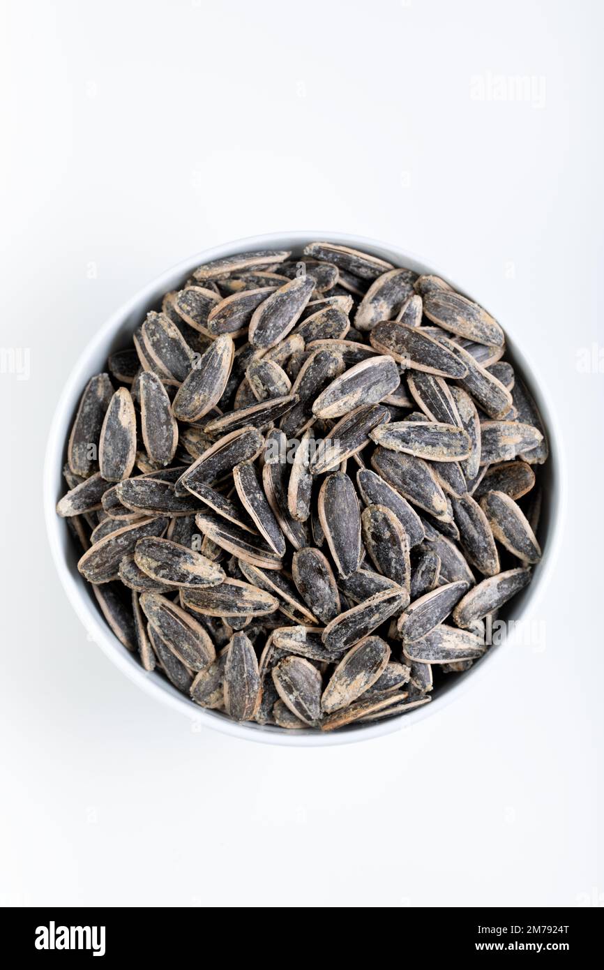 Black sunflower seeds in white hi-res stock photography and images - Alamy