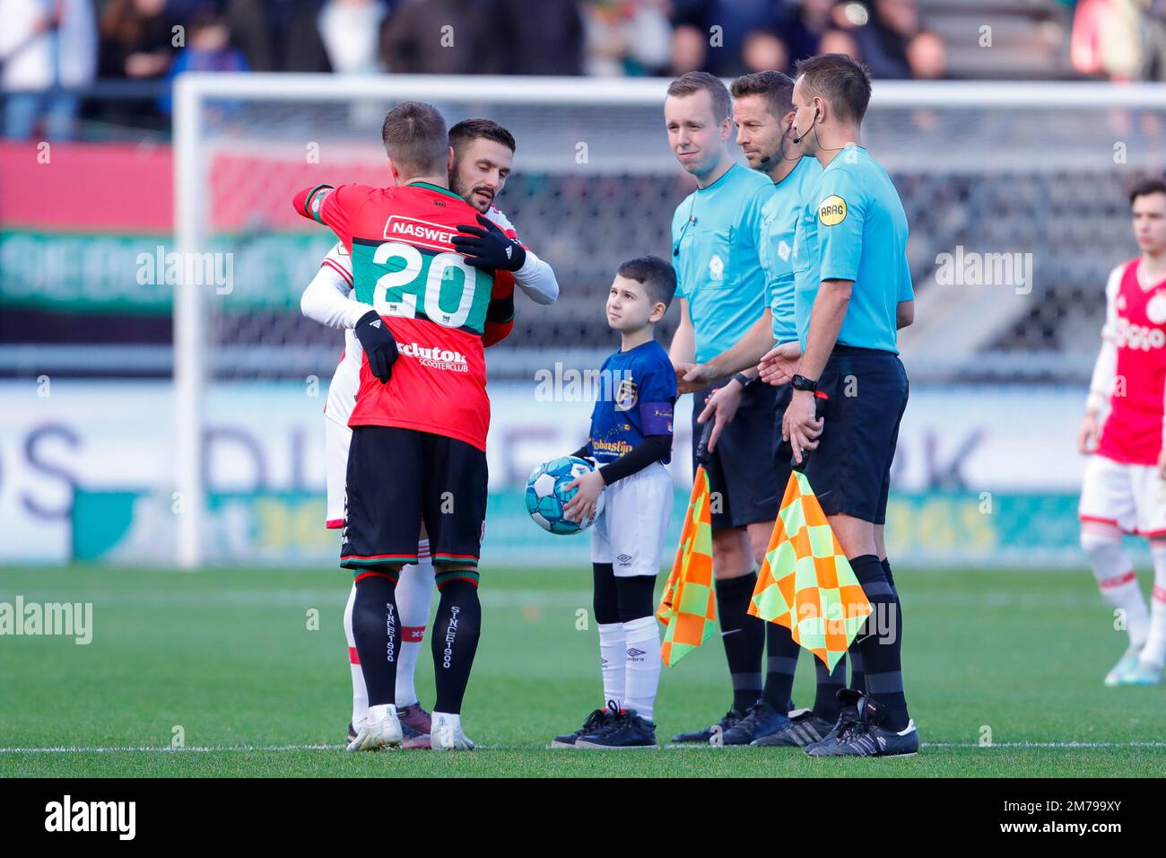 08-01-2023: Sport:NEC v Ajax  NIJMEGEN, NETHERLANDS - JANUARY 8: Dusan Tadic (Ajax) and Lasse Schone (NEC Nijmegen) during the match Eredivisie NEC Ni Stock Photo