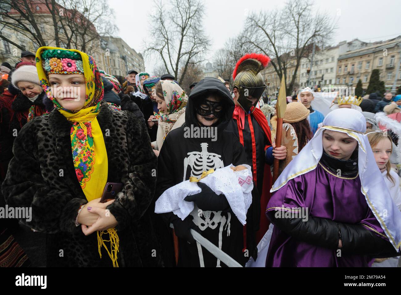 Lviv, Ukraine 8 january 2023. People dressed in costumes pose for a