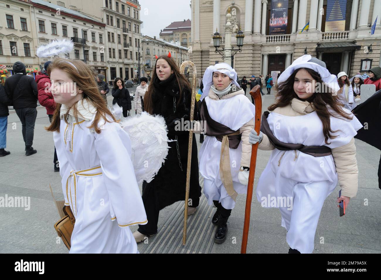 Lviv, Ukraine 8 january 2023. People dressed in costumes pose for a