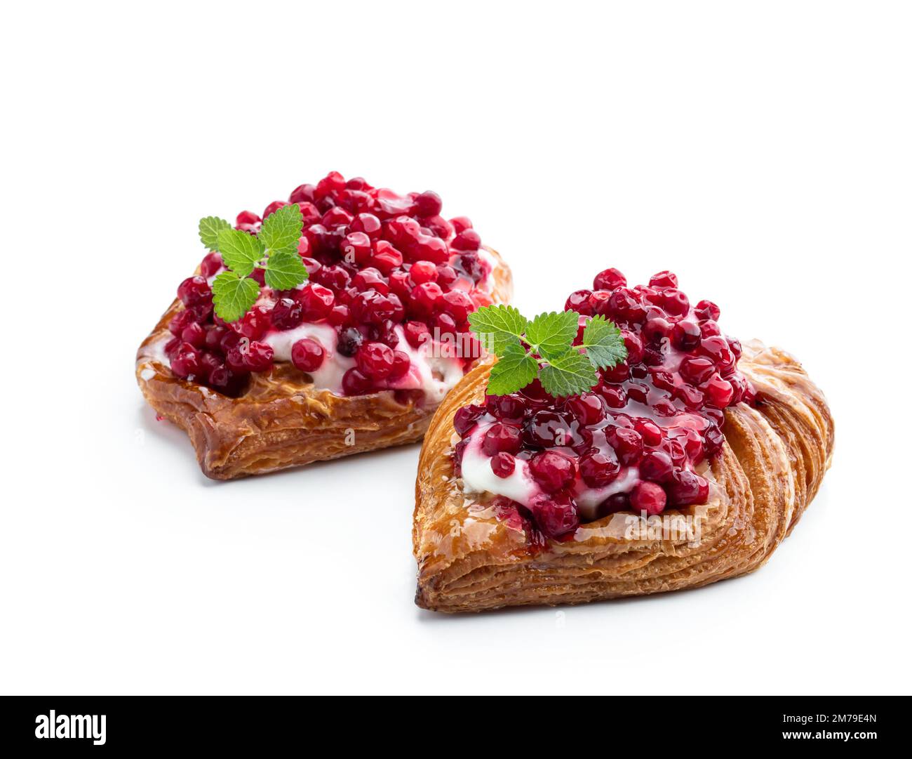 Flaky pastry with cream and cowberry isolated on white Stock Photo Alamy