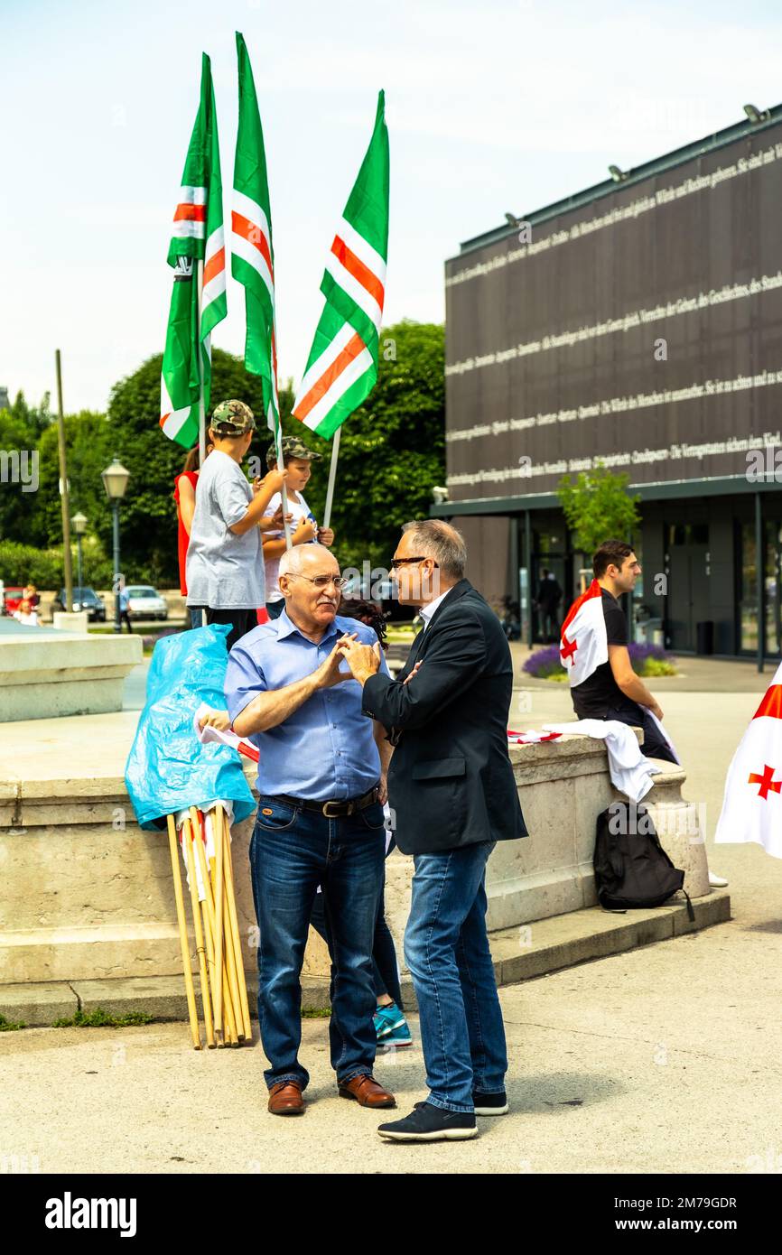 Anti Putin protesters in Heldenplatz, Vienna, June 2018, representing the people of Georgia, opposing Russian involvement in the country Stock Photo