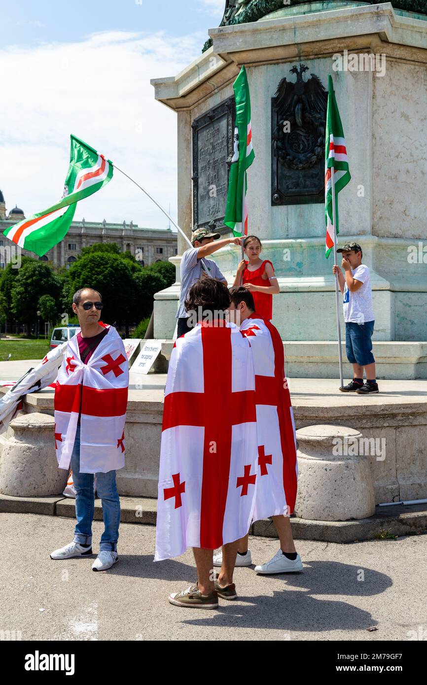 Anti Putin protesters in Heldenplatz, Vienna, June 2018, representing the people of Georgia, opposing Russian involvement in the country Stock Photo