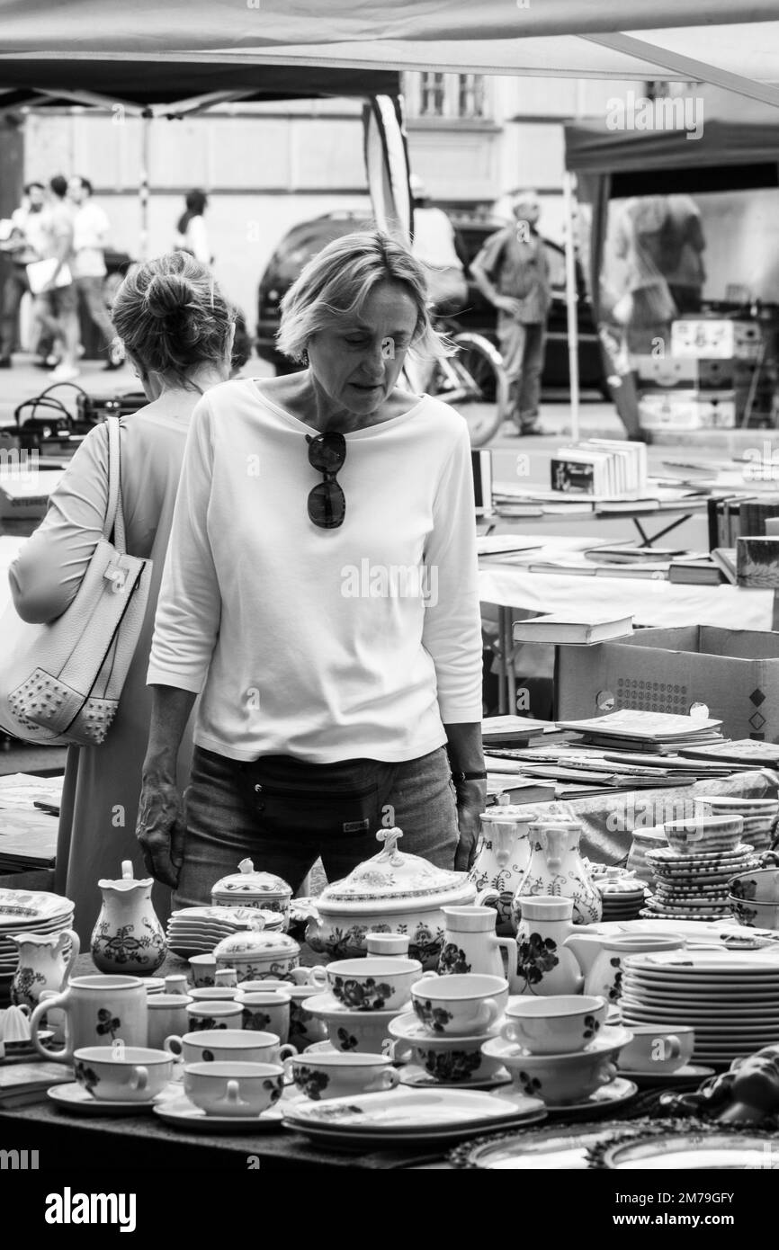 On the streets of Vienna, people shopping at a street market or going about their daily business Stock Photo