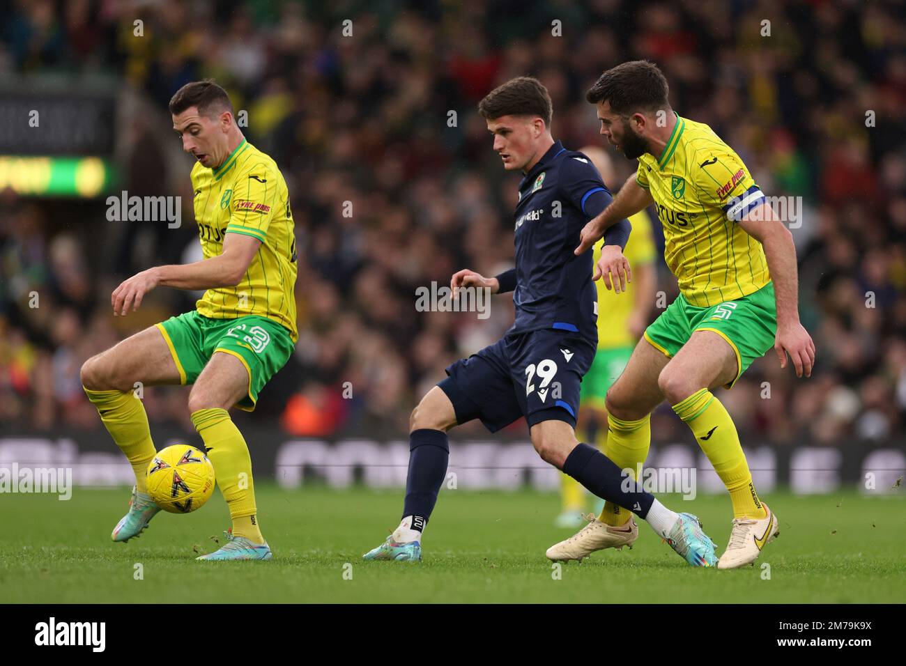 Carrow Road, Norwich, Norfolk, UK. 8th Jan, 2023. FA Cup Football, Norwich versus Blackburn Rovers; Jack Vale of Blackburn Rovers is under pressure from Grant Hanley of Norwich City Credit: Action Plus Sports/Alamy Live News Stock Photo