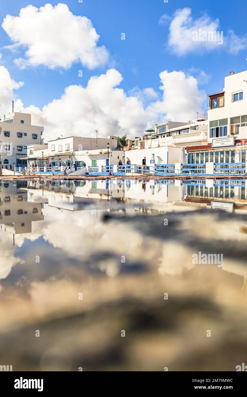 typical-white-buildings-and-restaurants-close-to-the-port-and-the