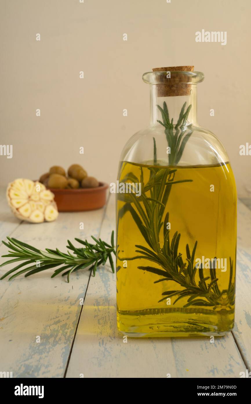 Andalusian olive oil with rosemary and garlic infusion Stock Photo Alamy