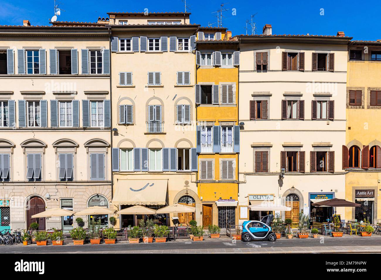 Pastel-coloured house facades at Piazza Pitti, Florence, Tuscany, Italy Stock Photo