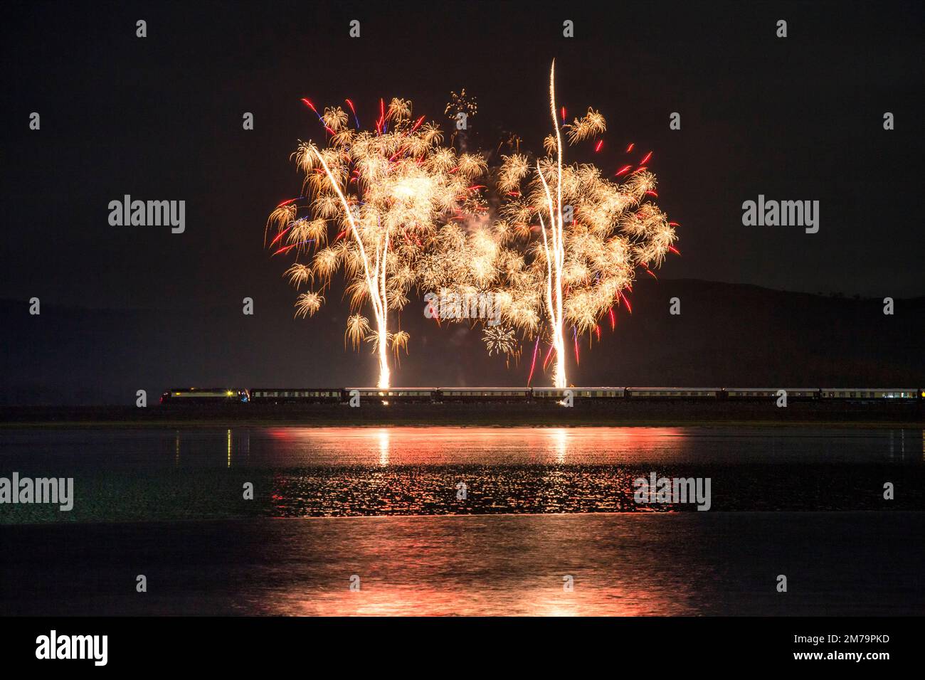 The Northern Belle luxury dining train stopped for a fireworks display laid on specially for the passengers at Arnside, Cumbria Stock Photo
