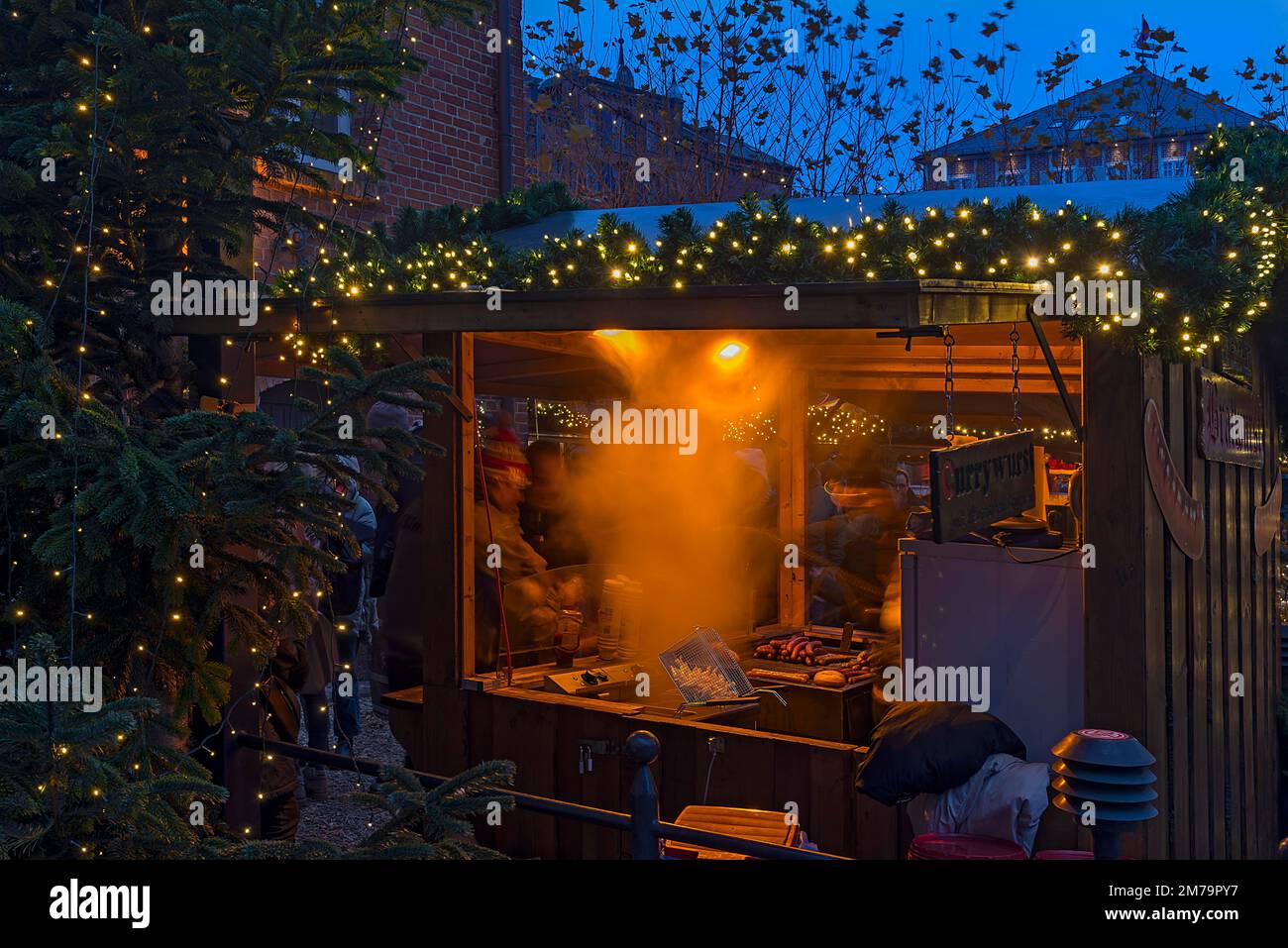 Bratwurst stand at the Christmas market, Lueneburg, Lower Saxony