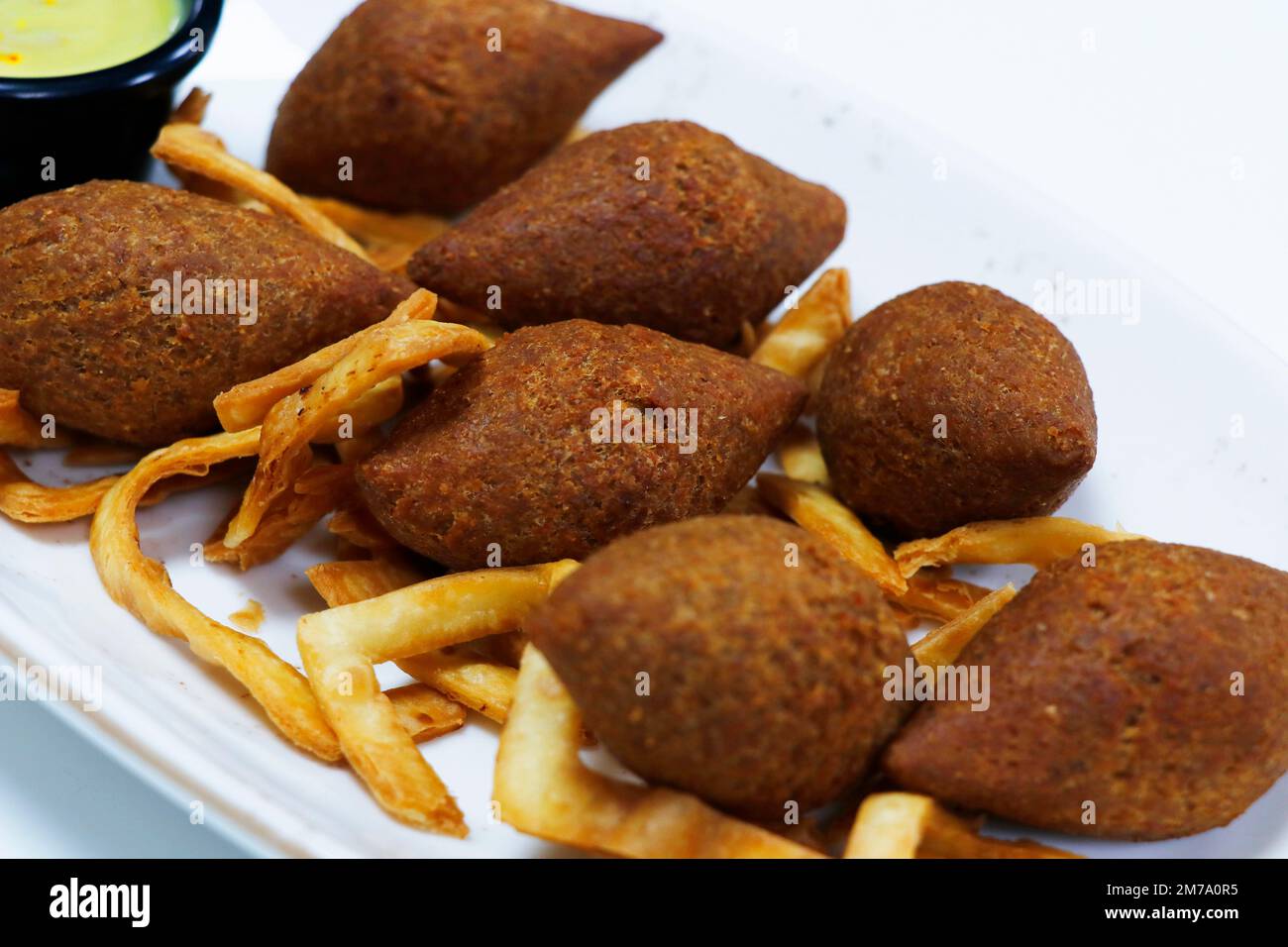 lamb kibbeh or kebbeh, popular middle eastern arabic lebanese snack in mezze platter Stock Photo