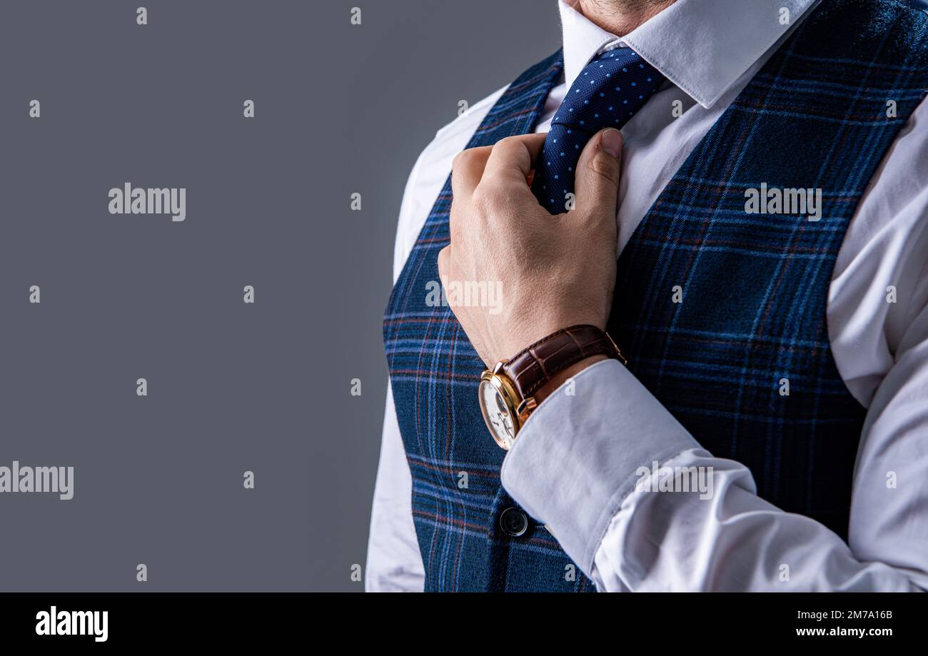 photo of man wear wristwatch, copy space. man in wristwatch and suit
