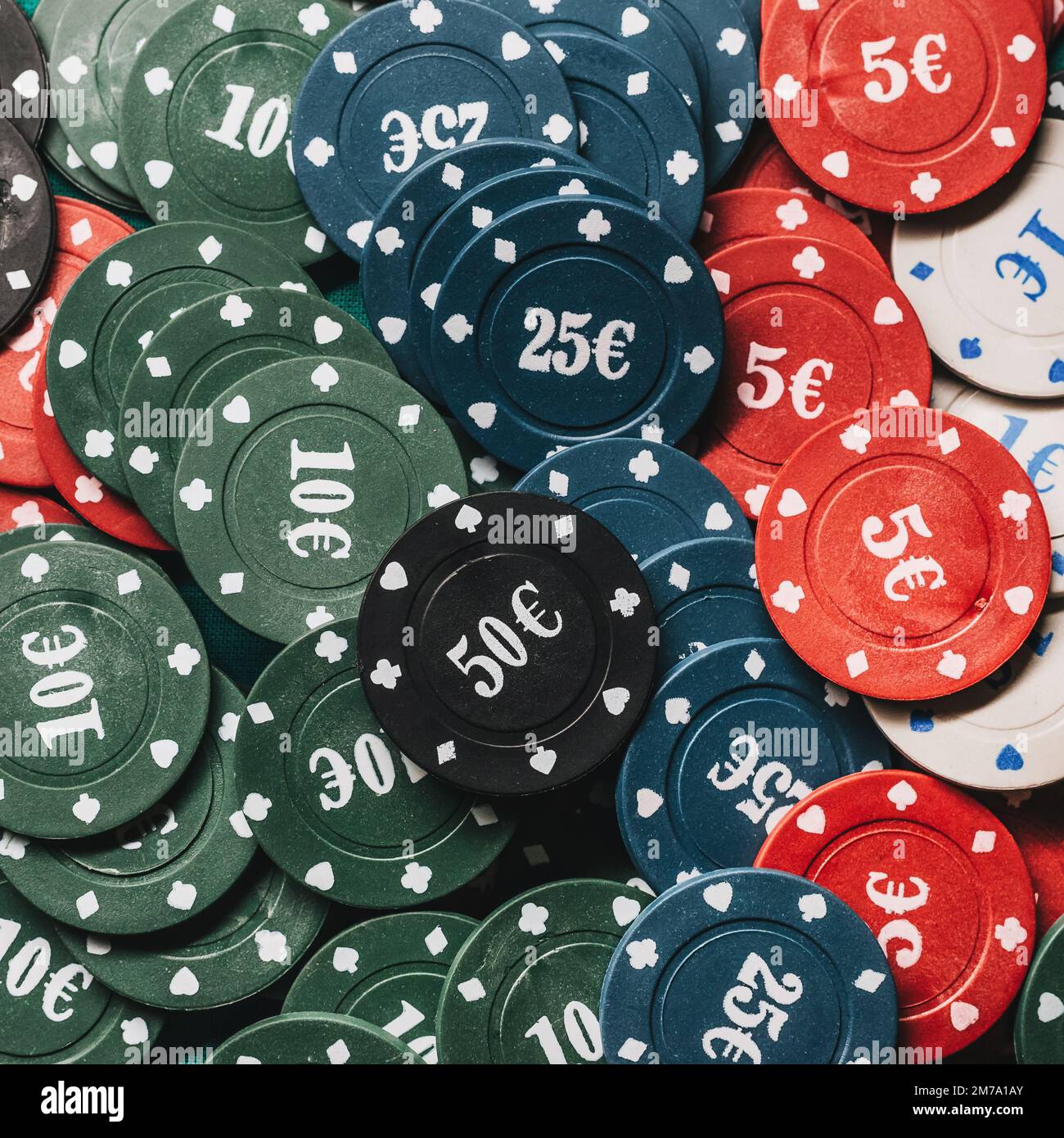 lots of poker chips with Euro icon closeup, top view Stock Photo Alamy
