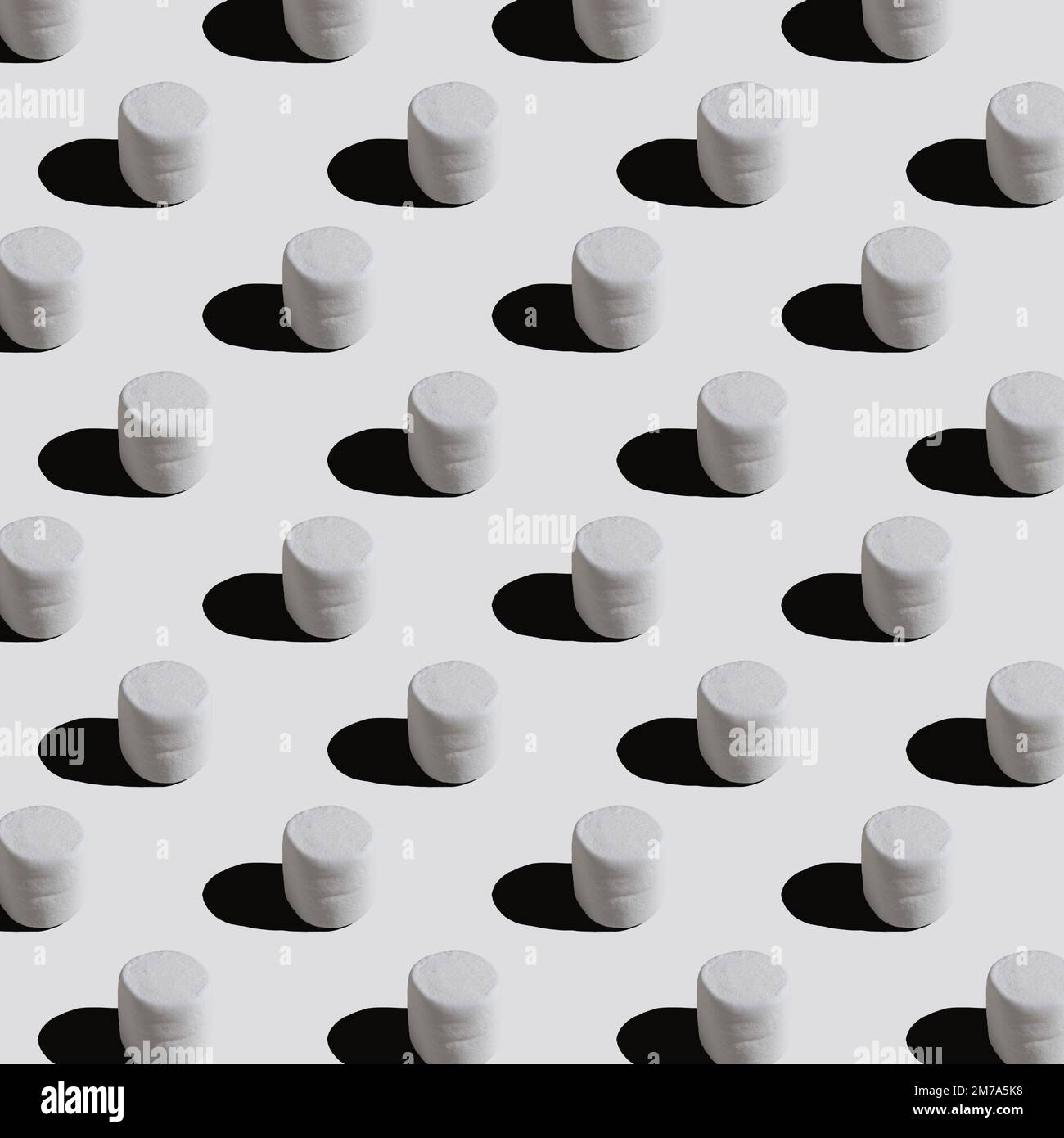 seamless minimalistic pattern of white marshmallows on white background  Stock Photo