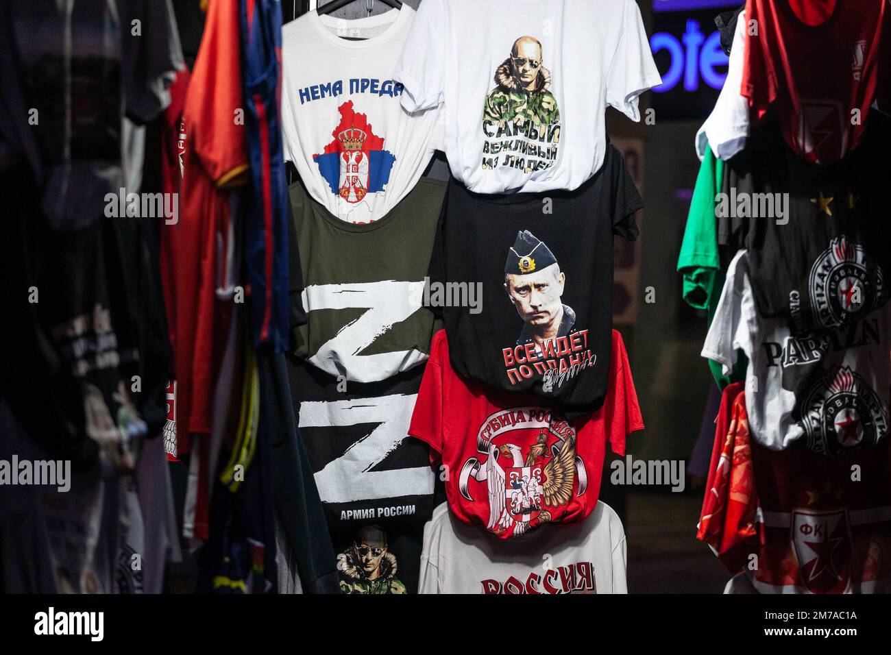 Picture of T-Shirts for sale in the streets of Belgrade, Serbia, with the white letter Z and portraits of Putin, in support to the russian war interve Stock Photo