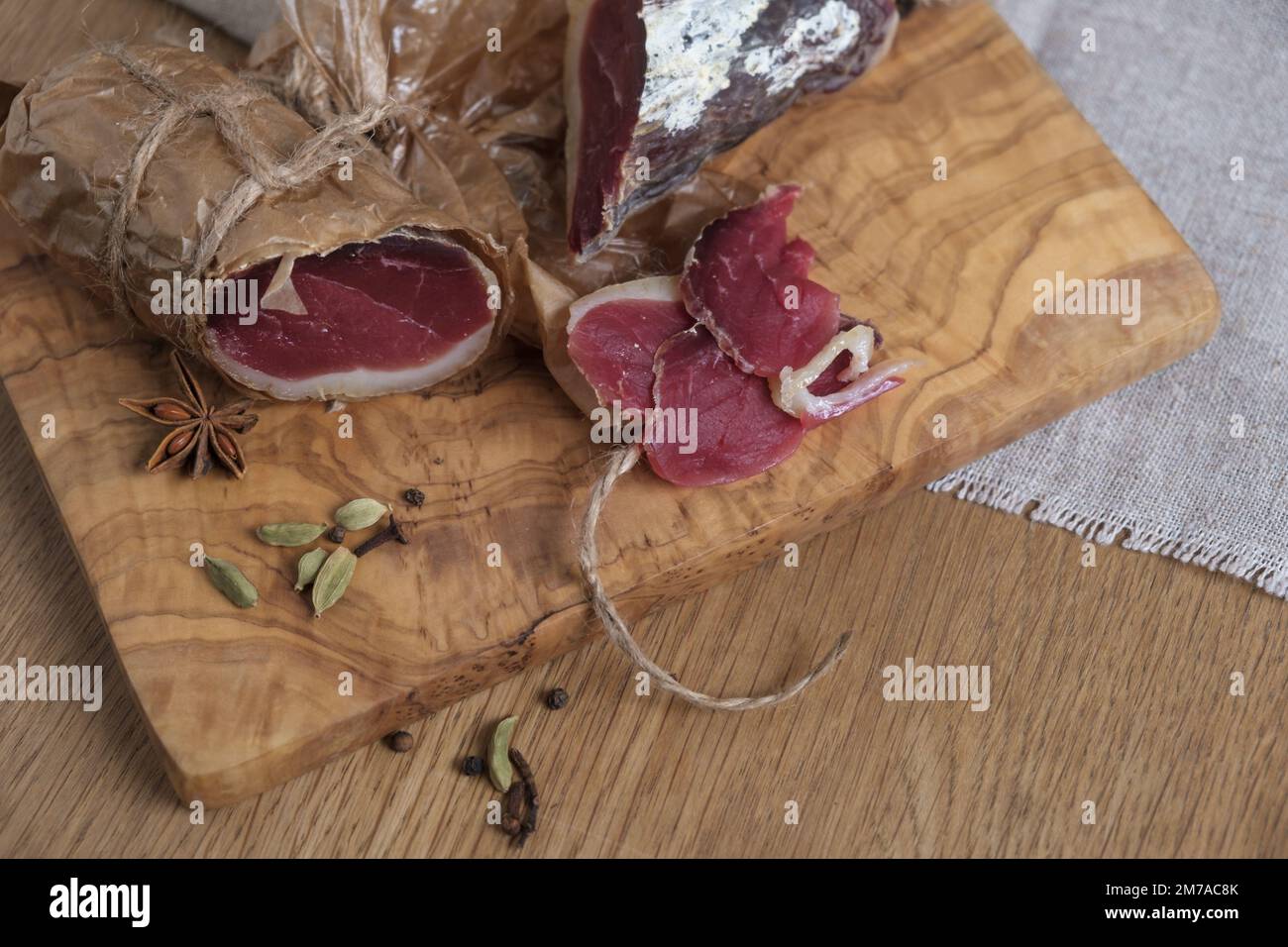 Close-up homemade duck jamon, homemade snack, jerky on board, selective focus Stock Photo