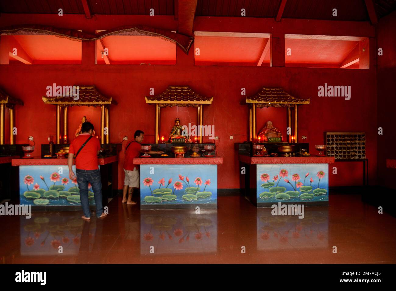 Devotees clean altar at a temple in Bogor, West Java, Indonesia on ...