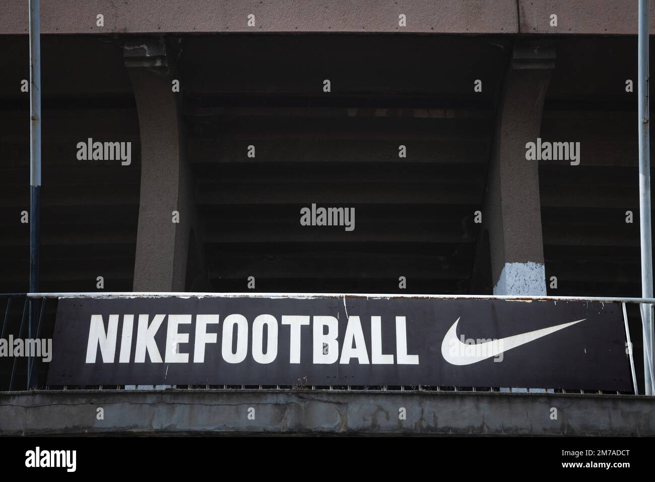Picture of a sign with the logo of Nike Football in front of a stadium in  Belgrade. Nike is an American multinational corporation that is engaged in  t Stock Photo - Alamy