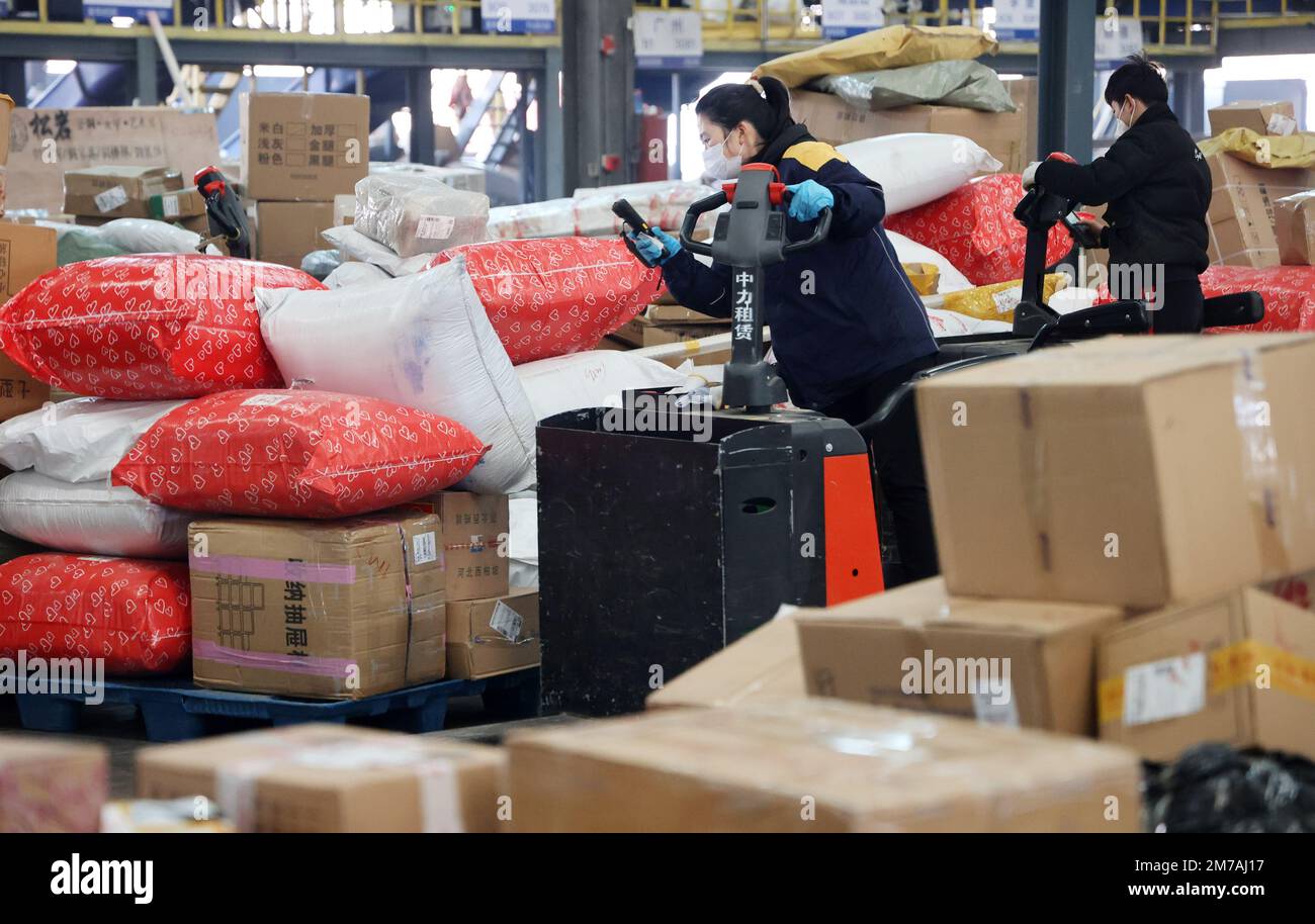 NANTONG, CHINA JANUARY 9, 2023 Employees of an express delivery