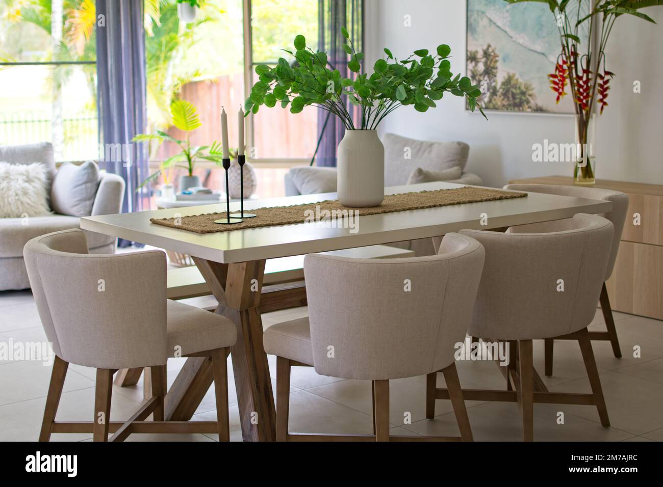 Table and chairs in modern dining room Stock Photo