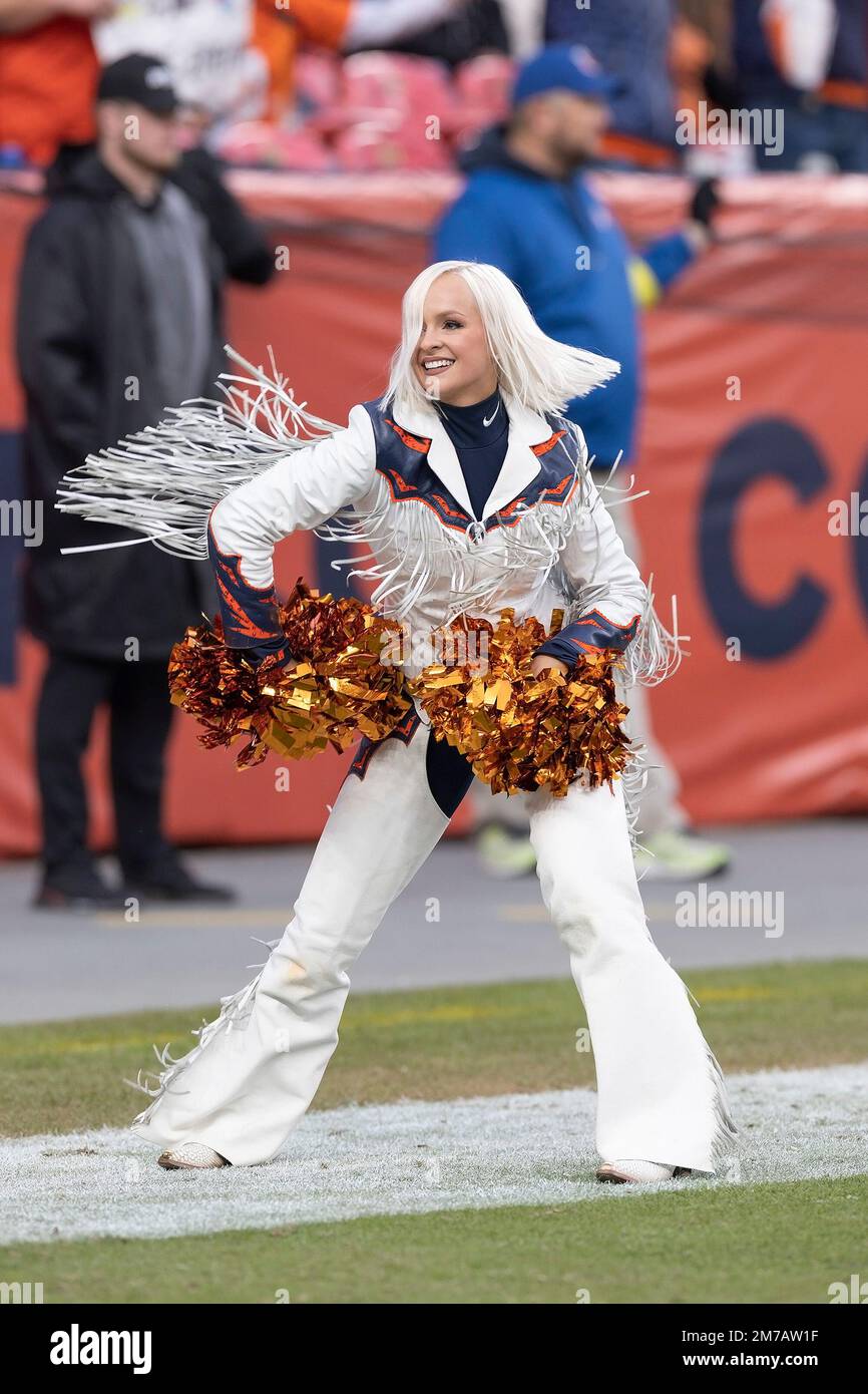 Denver, Colorado, USA. 8th Jan, 2023. Chargers WR MIKE WILLIAMS tries to  shake off a tackle by Broncos S JUSTIN SIMMONS during the 2nd. Half at  Empower Field at Mile High Sunday