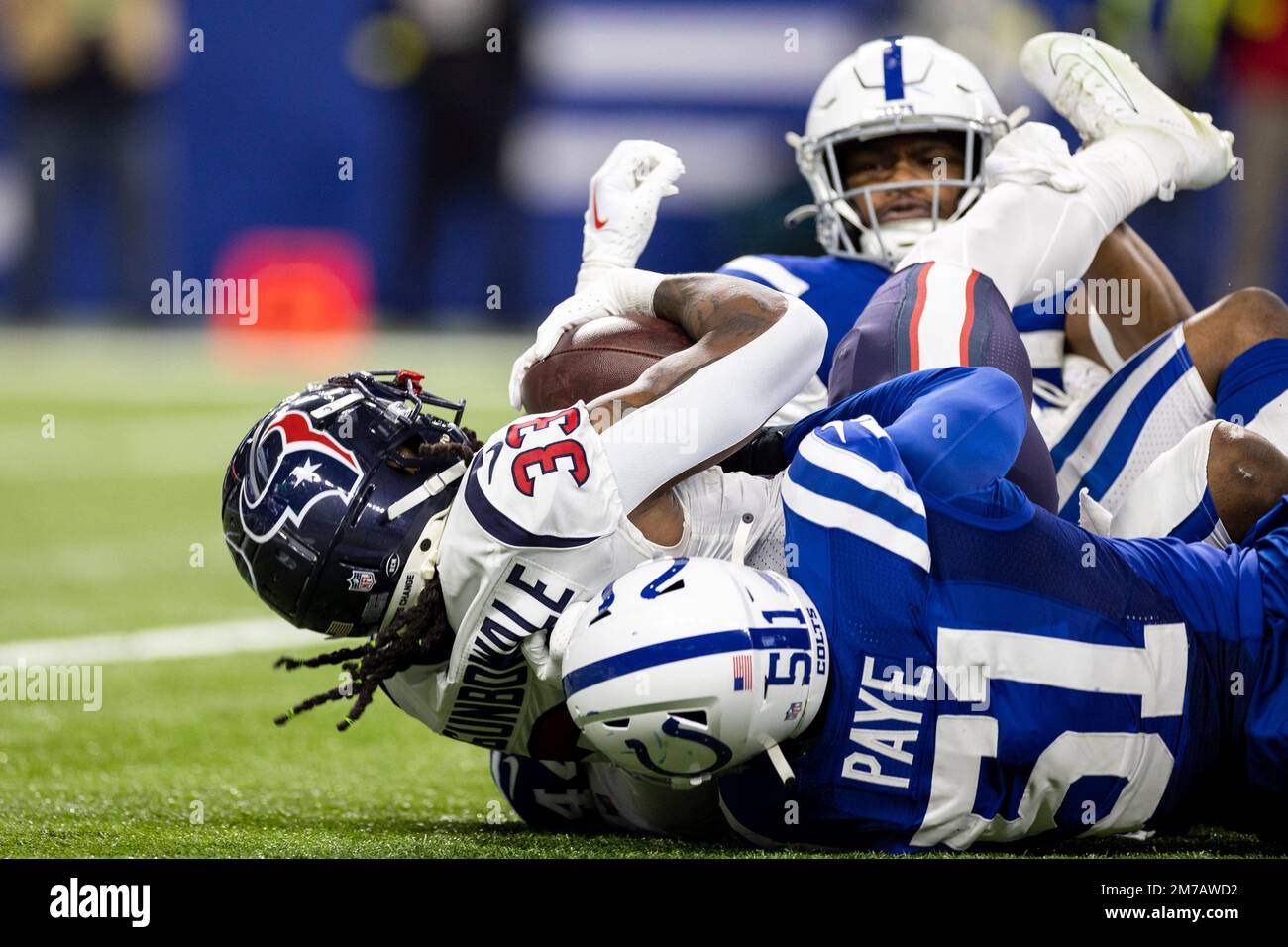 January 08, 2023: Indianapolis Colts defensive lineman Kwity Paye (51)  makes the tackle on Houston Texans running back Dare Ogunbowale (33) during  NFL game in Indianapolis, Indiana. John Mersits/CSM/Sipa USA.(Credit Image:  ©