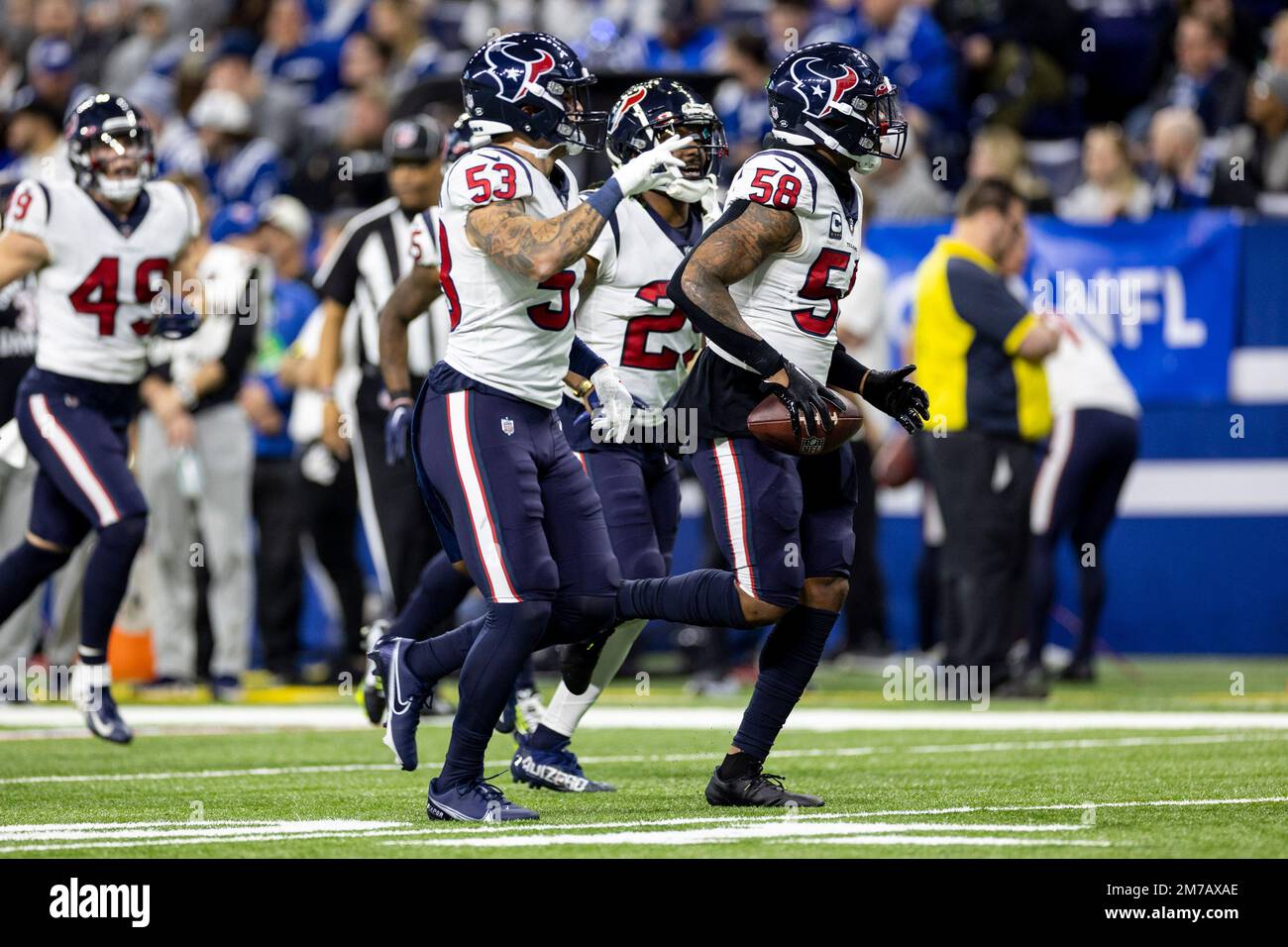 Houston Texans linebacker Christian Kirksey (58), Houston Texans defensive  back Tavierre Thomas (37) and Houston Texans defensive back Justin Reid  (20) bring down Indianapolis Colts wide receiver Ashton Dulin (16) during an