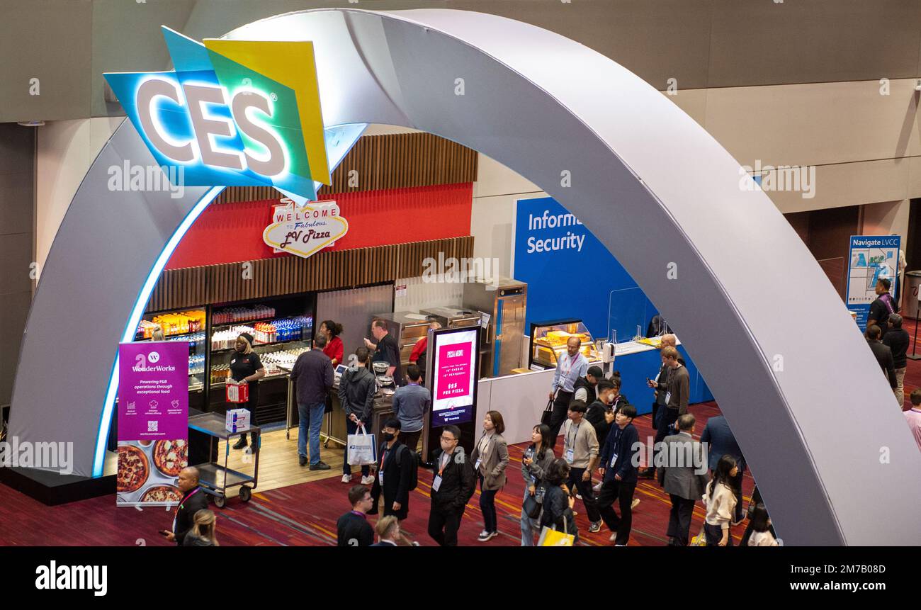 Las Vegas, USA. 06th Jan, 2023. Visitors to the CES technology trade show  are on the move at the Las Vegas fairgrounds under an industry show logo.  With around 115,000 attendees, CES