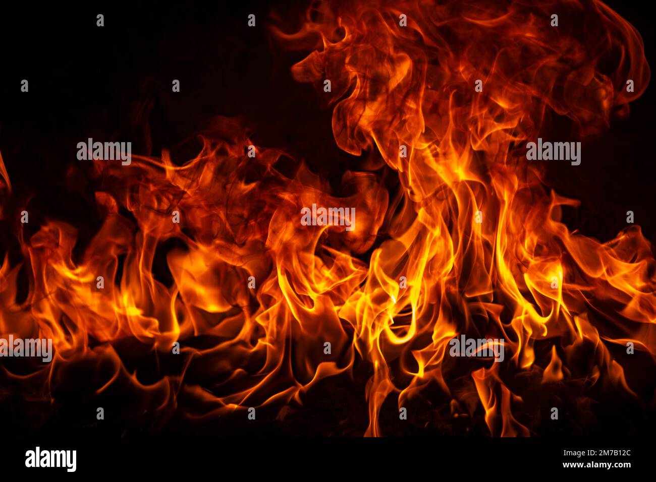 Texture of fire on a black background. Abstract fire flame background,  large burning fire Stock Photo - Alamy