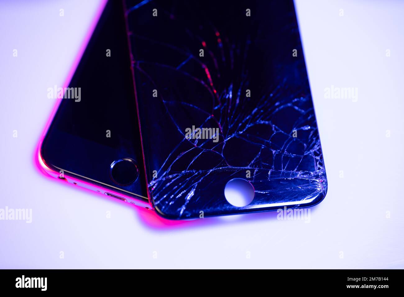 South Tyrol, Italy - Jan. 7. 2023: Broken Apple iPhone 6 Display on top of repaired iPhone 6 Stock Photo