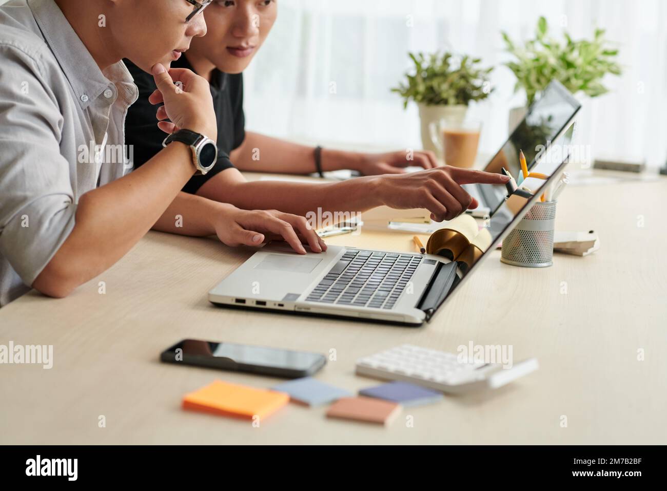 Young architects working on presentation on projects Stock Photo