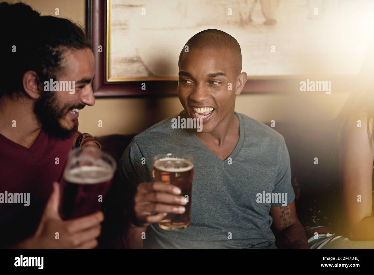 Friends laughing bar hi-res stock photography and images - Alamy
