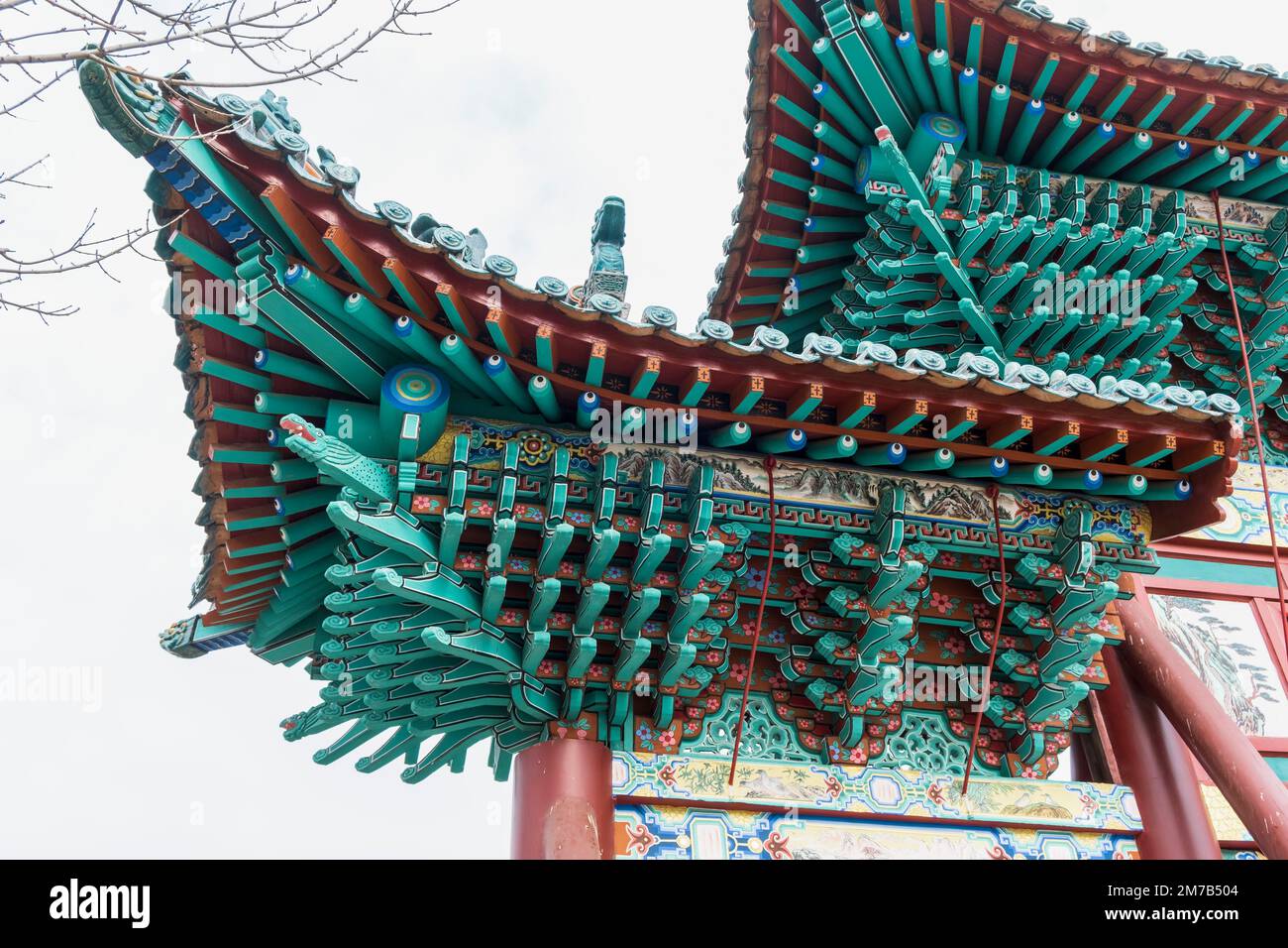 fragment of complicated wooden roof of Chinese Temple Stock Photo