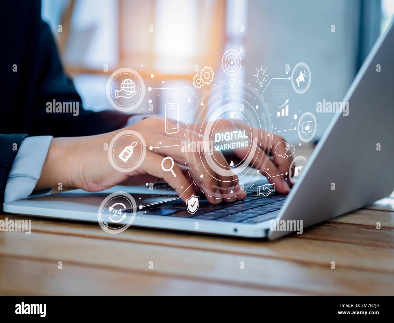 Digital marketing and social media concept. Words with strategy icons appear while people using laptop. Business data solution, seo, content, advertis Stock Photo