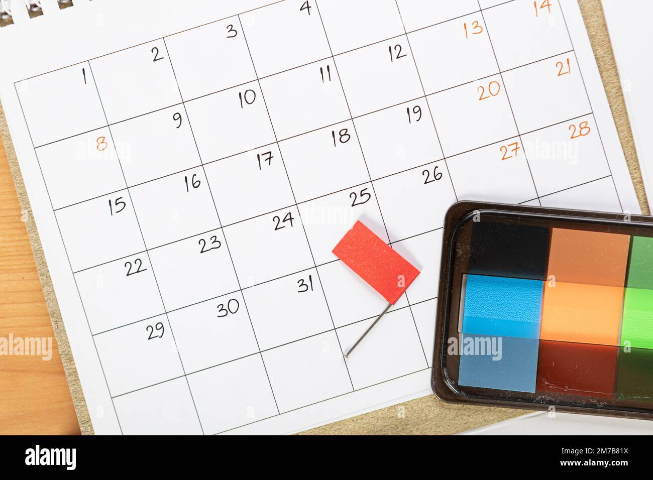 Calendar and agenda reminders, work from home online. desktop calendar with  stationery and pen pencil, keyboard. mark a holiday trip or plans in a dia  Stock Photo - Alamy