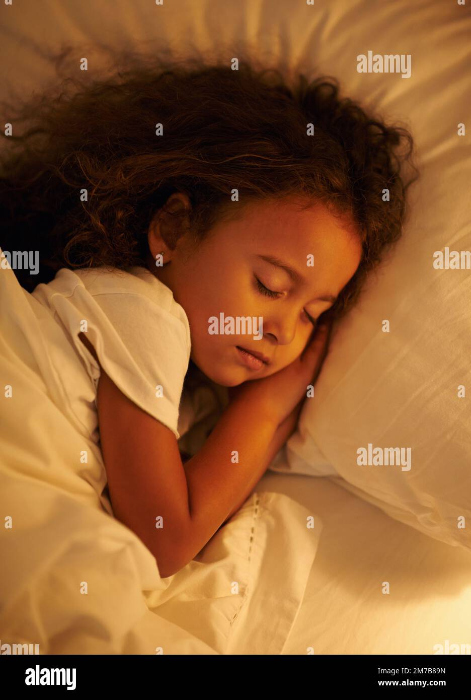 Only the sweetest dreams here. A cute little girl fast asleep in a