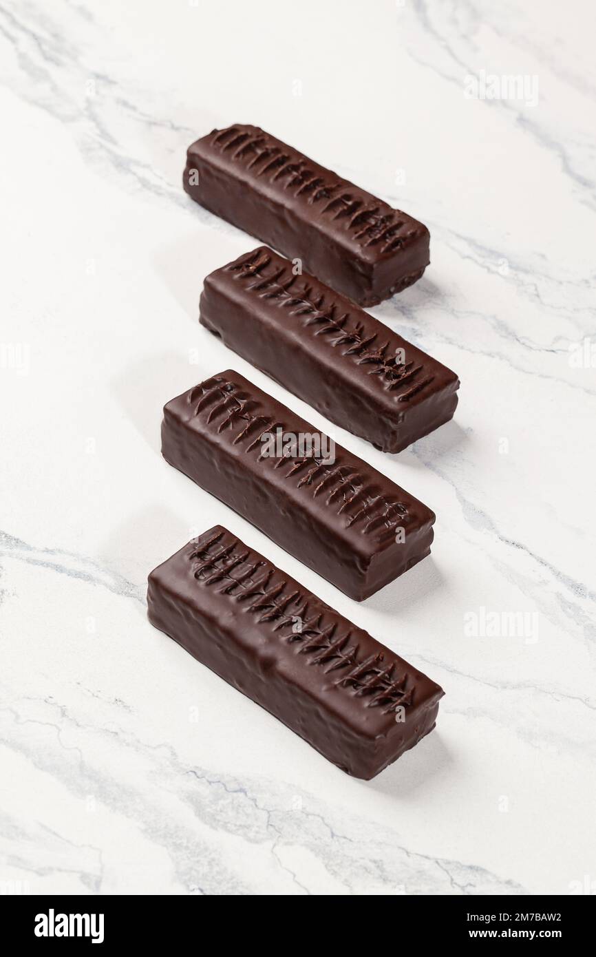 Chocolate bars without sugar stuffed with dried fruits and nuts Stock
