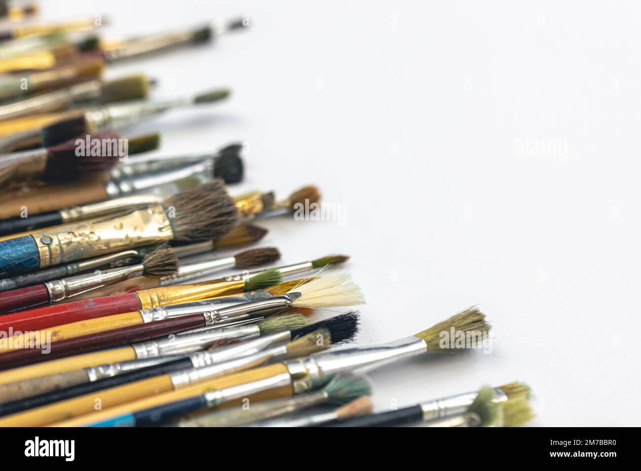 Close-up, brushes for drawing on a white background. Stock Photo