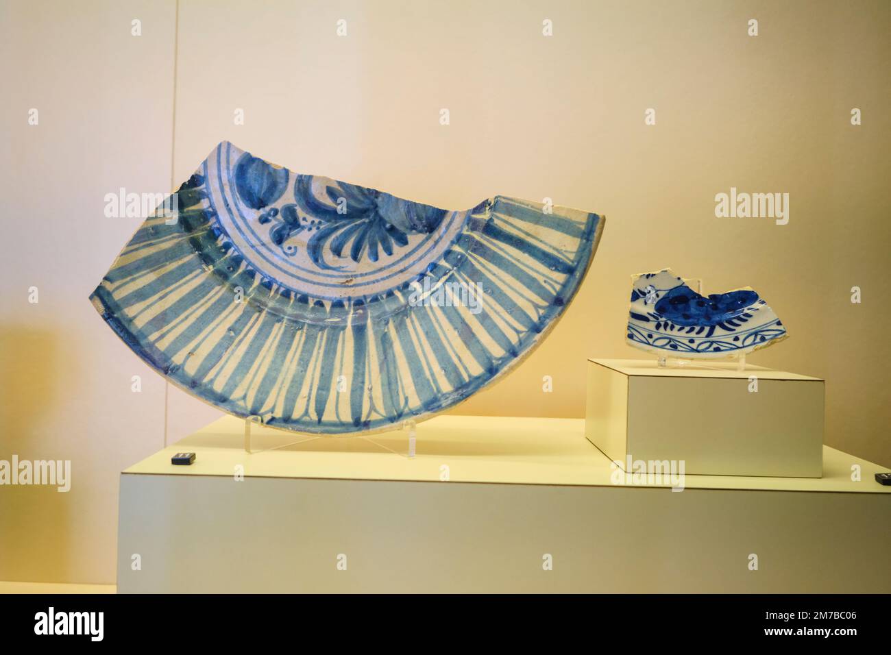 A display case in one of the gallery rooms, showing ancient pottery. At