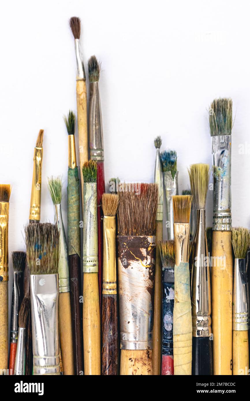 Close-up, brushes for drawing on a white background. Stock Photo