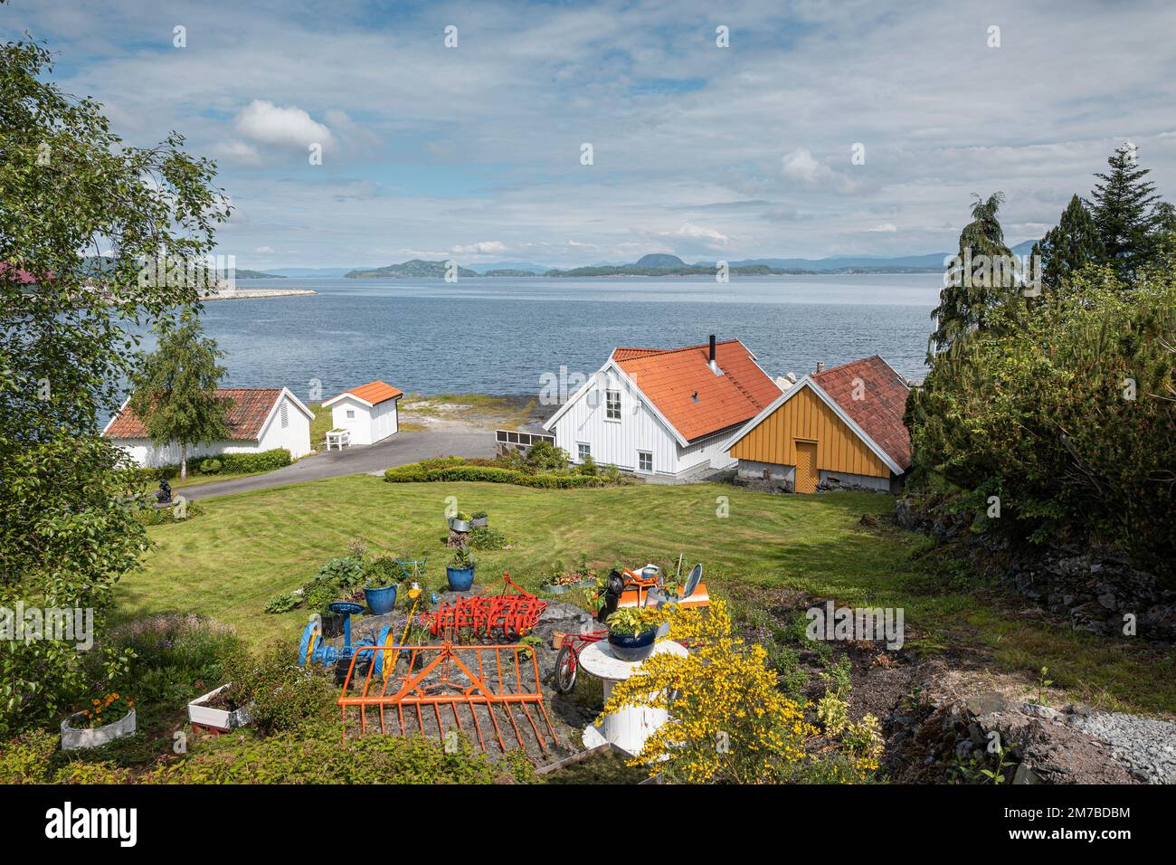 A scenic view of fjord seen from the Viskavegen, near Tau, Norway with  rural houses on the shore Stock Photo - Alamy