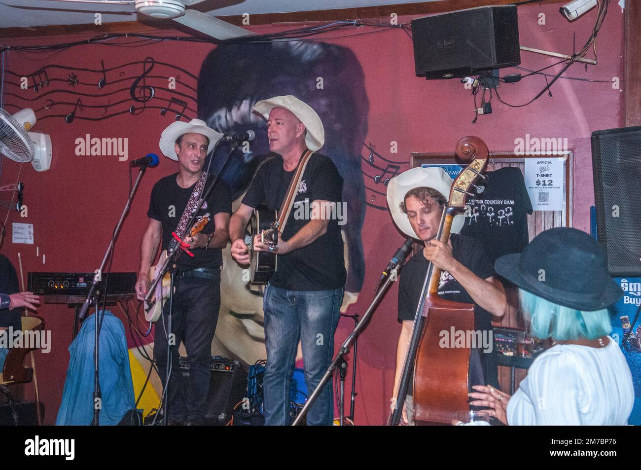 'The Three Country Drunks' playing live at The Sundance Inn & Saloon. Phnom Penh, Cambodia. © Kraig Lieb Stock Photo