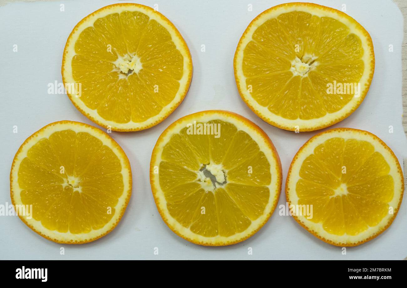 Sliced oranges for drying on paper Stock Photo