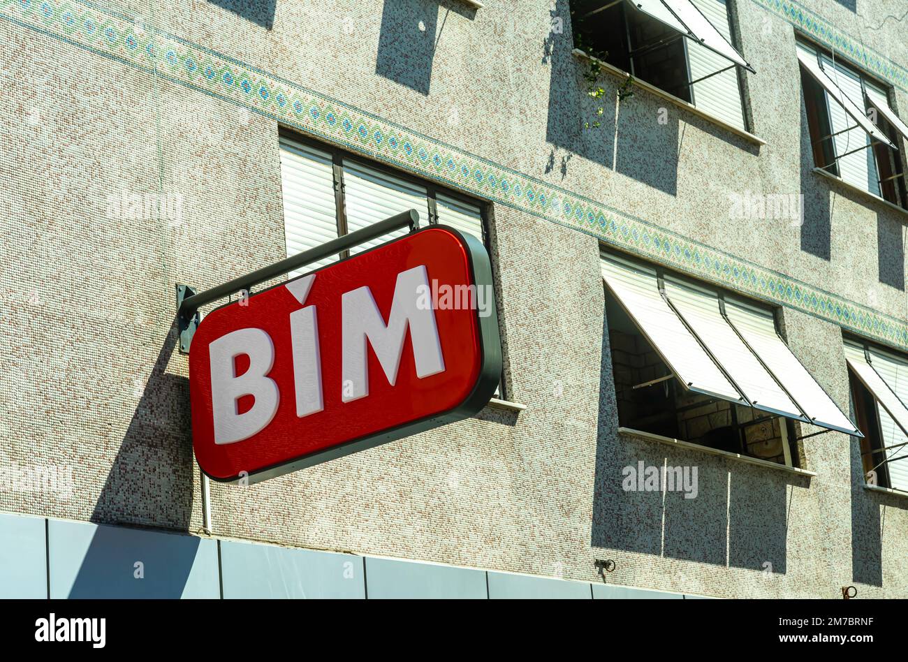 BIM supermarket sign. BIM is a chain store, retail store selling halal foods, affordable pricing. Istanbul, Turkey Stock Photo